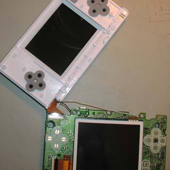 Bottom of DS Lite flipped over to reveal solder side of the PCB.